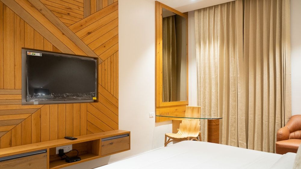 Hotel Clarks Inn Suites Kangra Deluxe room with King Bed 3