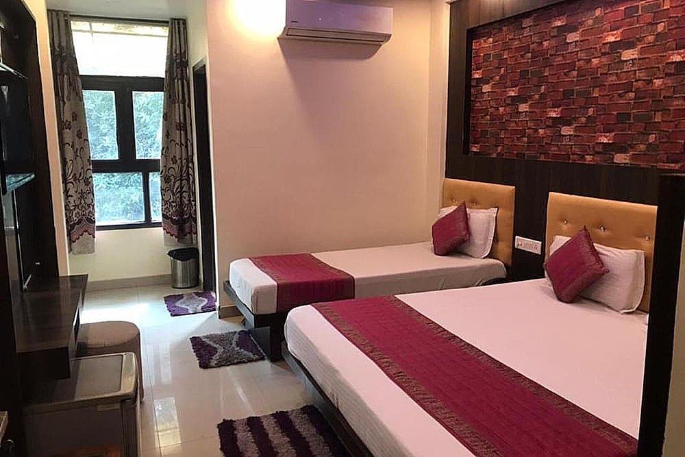 Deluxe Quadruple Room, City View