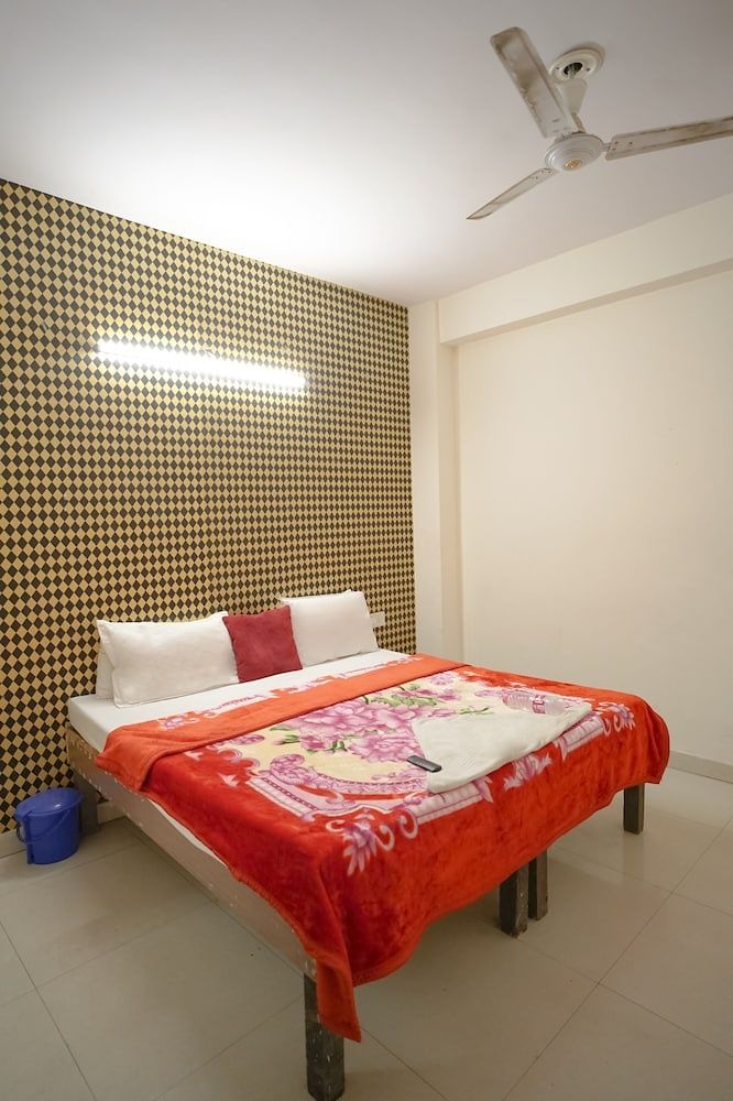 Roomshala 037 Honey Inn Family Quadruple Room 7