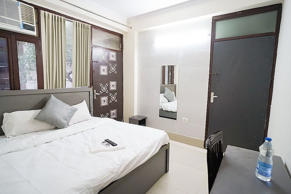 Roomshala 034 Grihum Noida Sector 63 Deluxe Double Room 14