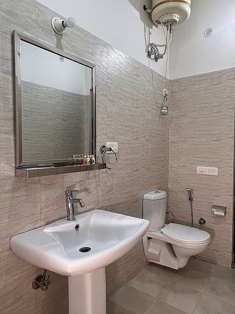 Yogved Hospitality and Resort Deluxe Room 8