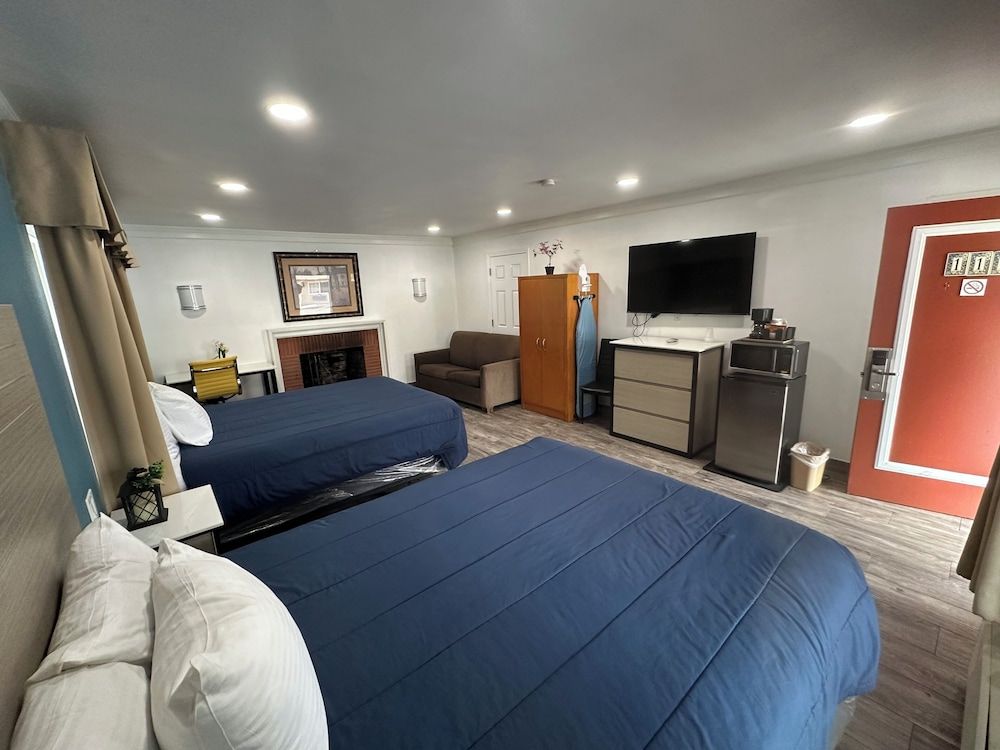 Deluxe Room Two Queen Beds and sofabed