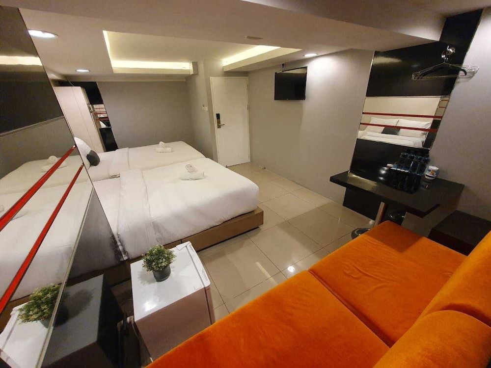 Quadruple Room with Shared Bathroom