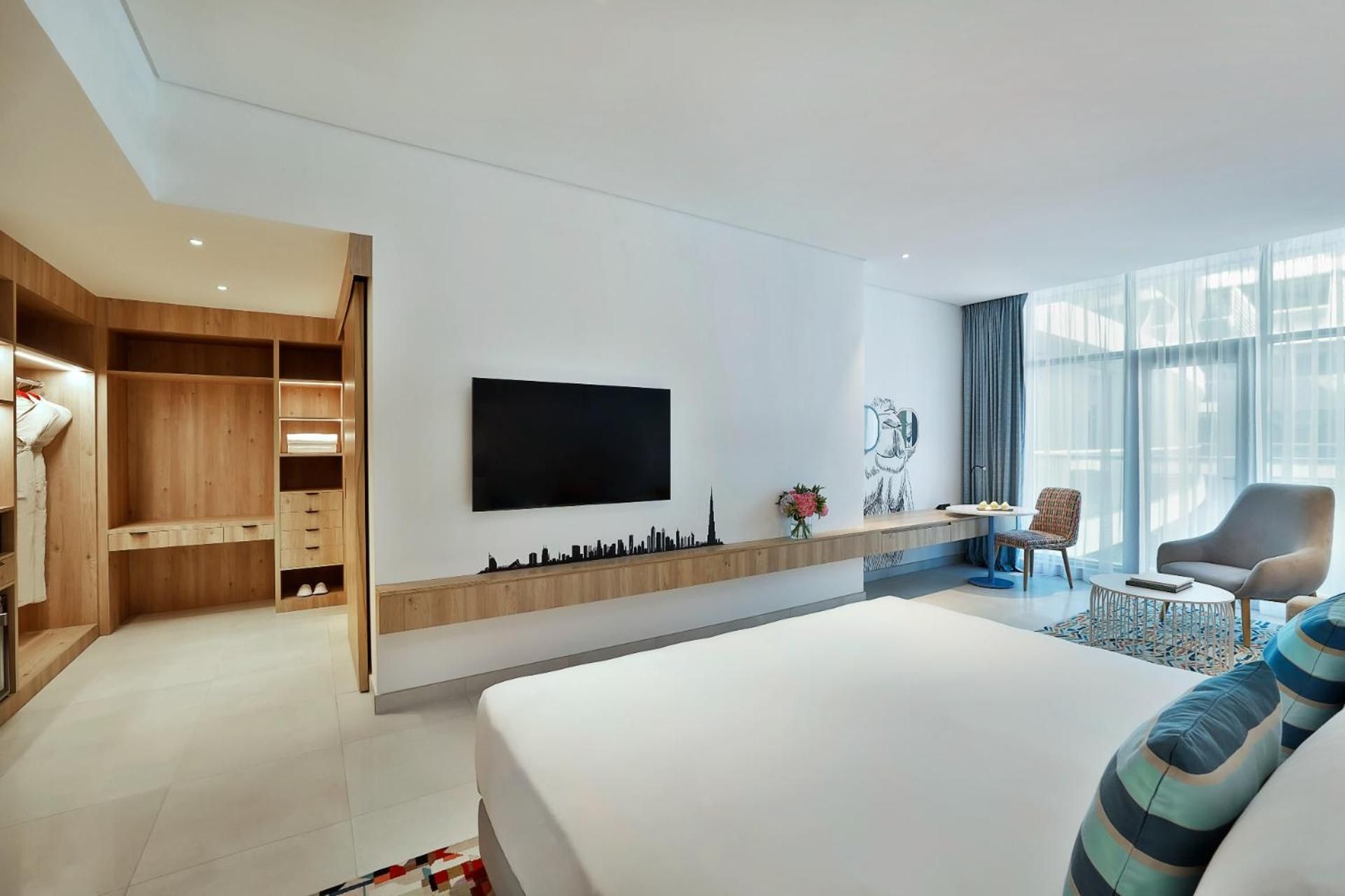 Deluxe Family Room with Balcony, Beach & Rooftop Infinity Pool Access, Kids Club Access ,Shuttle to Mall Of Emirates