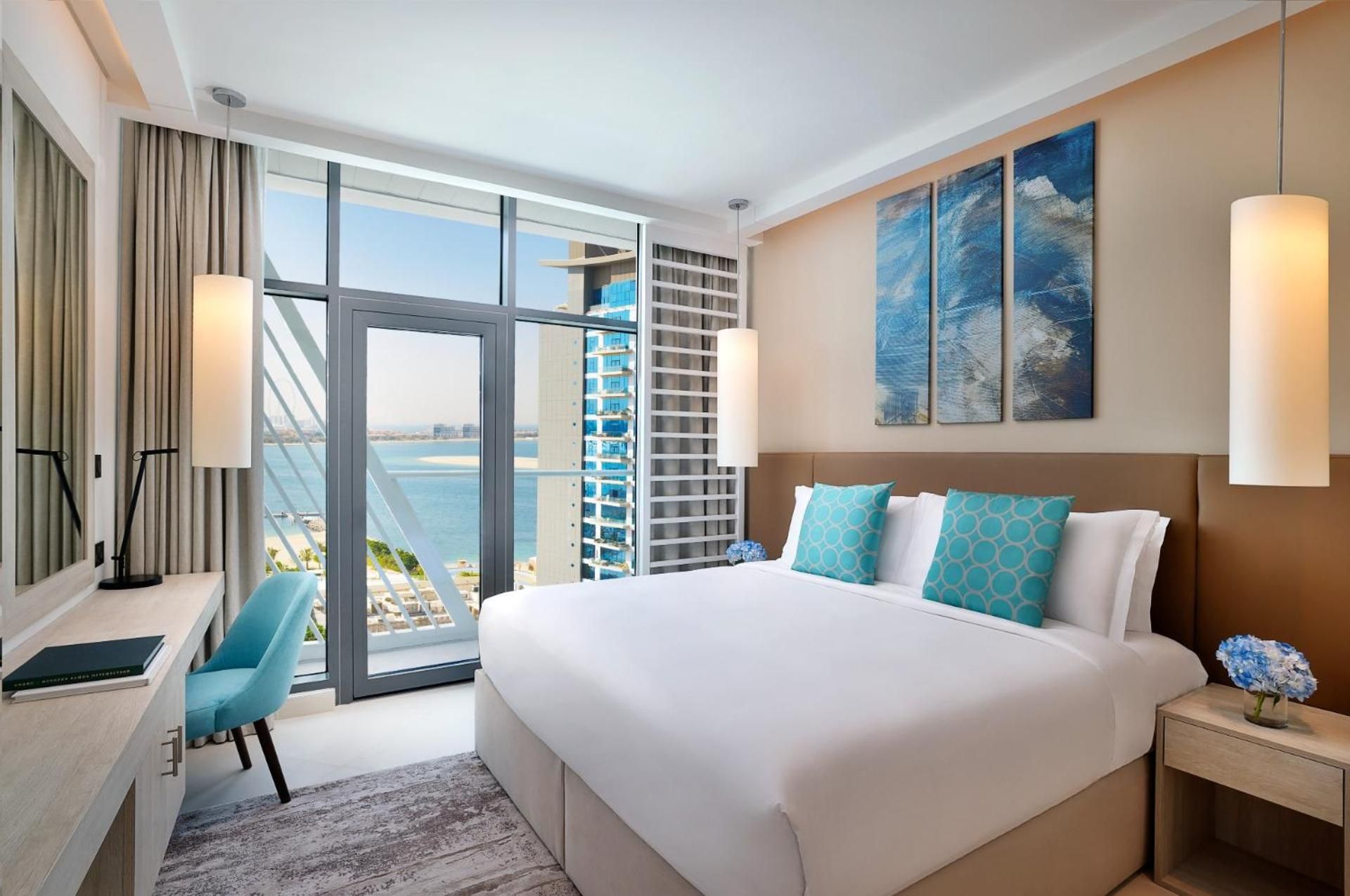 Superior One Bedroom Sea View Apartment with Balcony, Kitchen, Executive Lounge Access, Complimentary Airport Transfer, Beach & Rooftop Infinity Pool Access, Shuttle to Mall Of Emirates