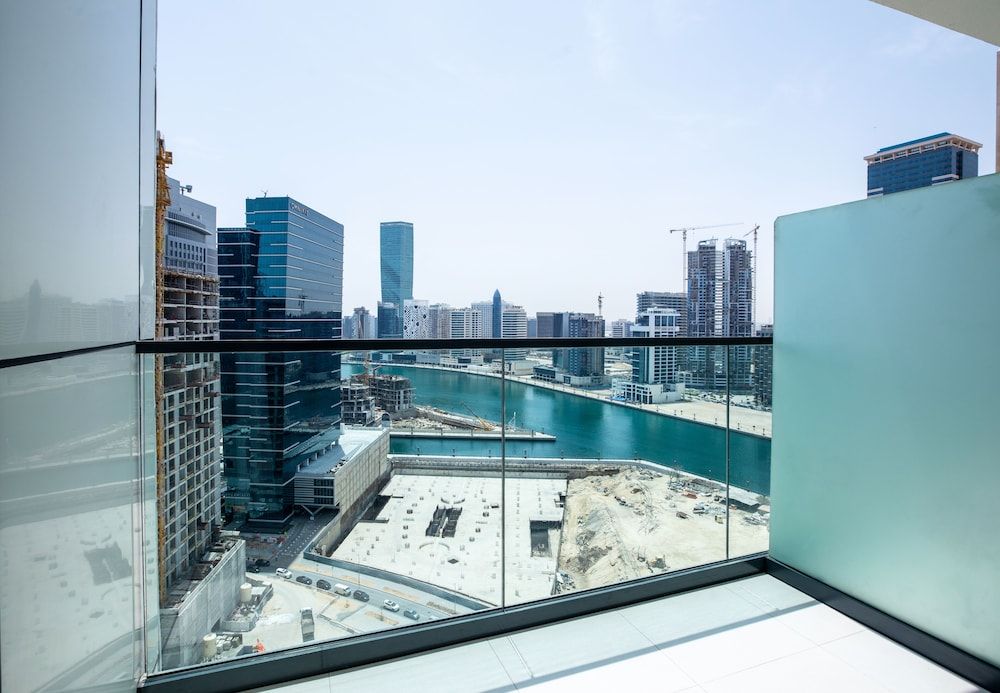 Tanin - Exquisite 1BR Apt in Zada Tower with Canal Views Deluxe Apartment 14