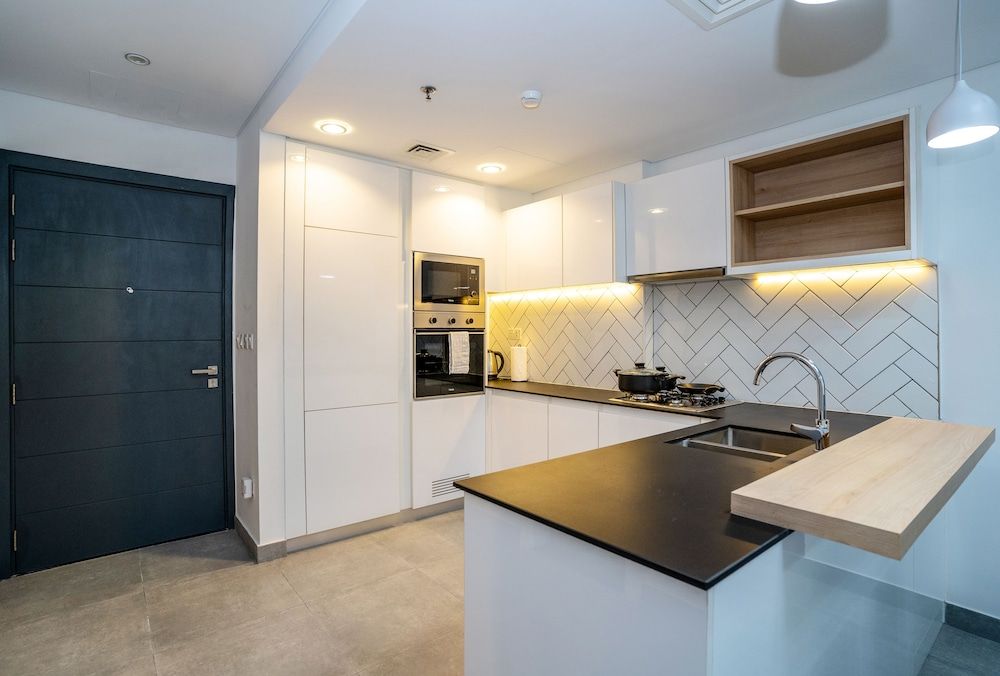 Tanin - Affordable Luxury and Fully Furnished 1BR in JVC Comfort Apartment 10