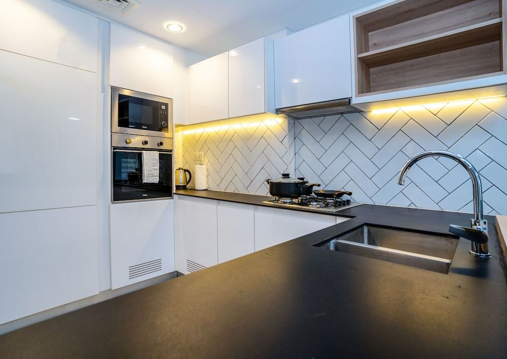 Tanin - Affordable Luxury and Fully Furnished 1BR in JVC Comfort Apartment 8