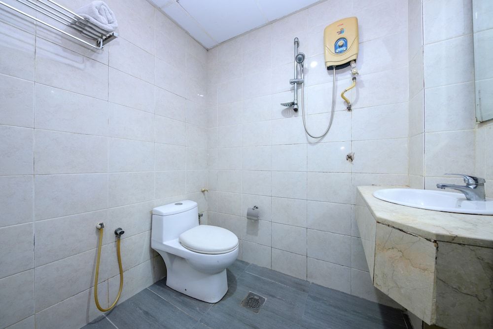 OYO 89571 Eco Palace Hotel Deluxe Single Room 4