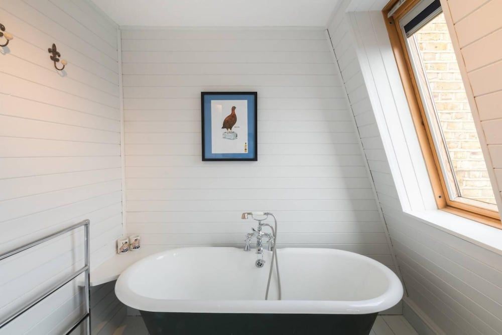 Charming 4-bed House w Garden in Fulham House 32