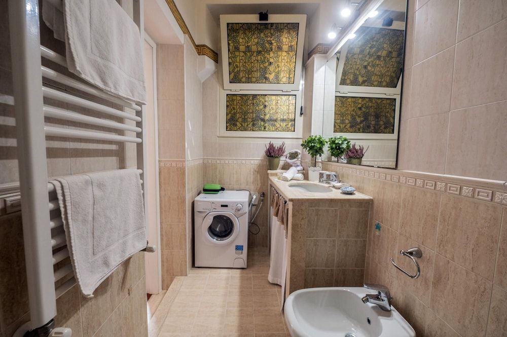 Colosseum 2BR Elegance and Charm Apartment 16