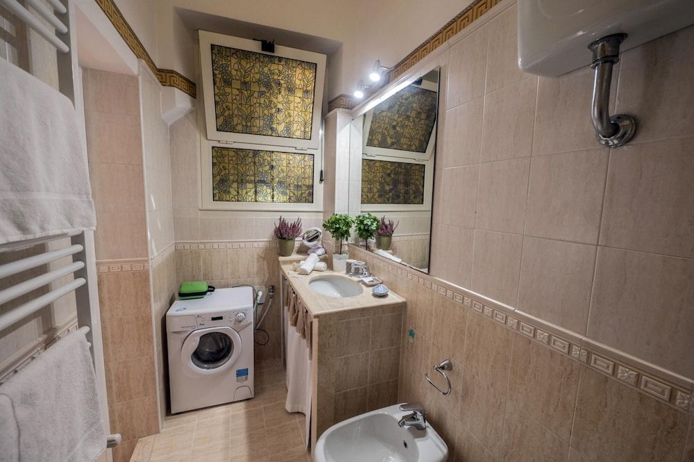 Colosseum 2BR Elegance and Charm Apartment 15