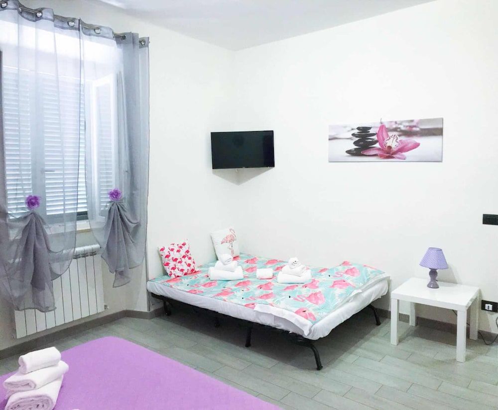 Alloggio Turistico Colosseo Quadruple Room, Shared Bathroom, Garden View 3