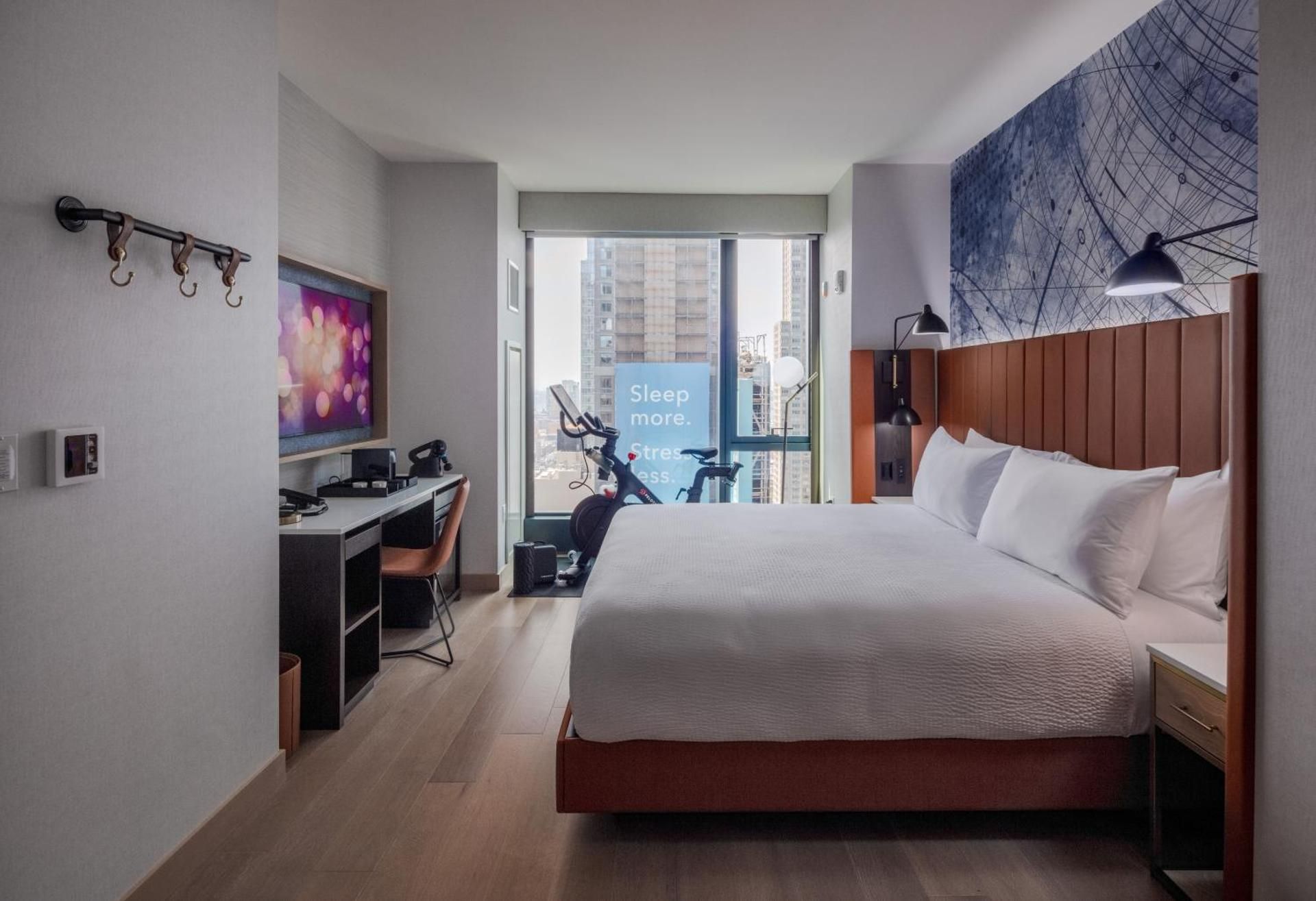 Wellness King Room with Peloton Bike and Square View