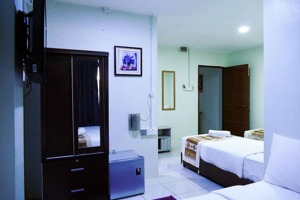 Milvus Hotel Quad Room