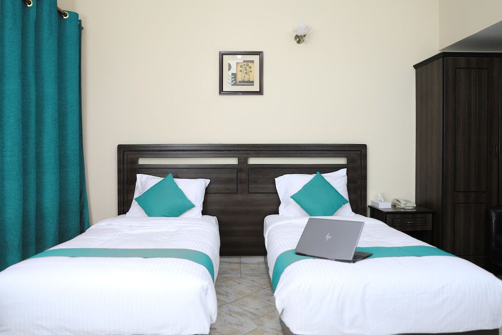 RUWI BEACH HOTEL APARTMENTS Standard Twin Room 4