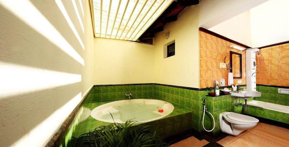 Abad Whispering Palms Cottage with Garden View 6