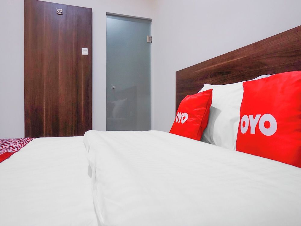 Super OYO 90115 Near Pasar Baru Standard Double Room 6