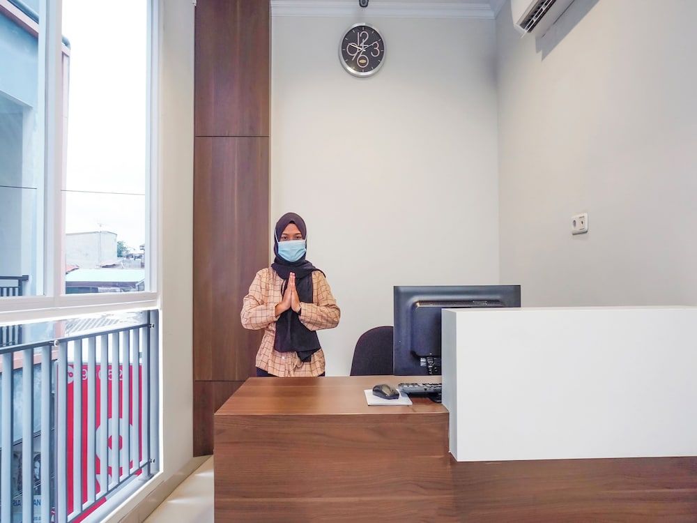 undefined Super OYO 90115 Near Pasar Baru 4