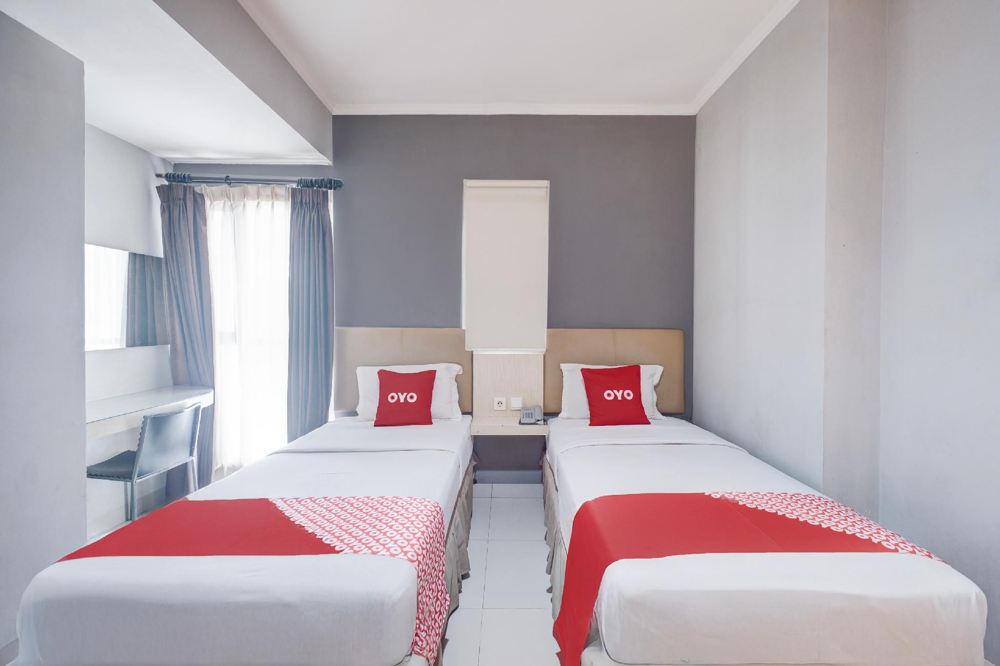 Collection O Hotel Antara Deluxe Twin Room 6