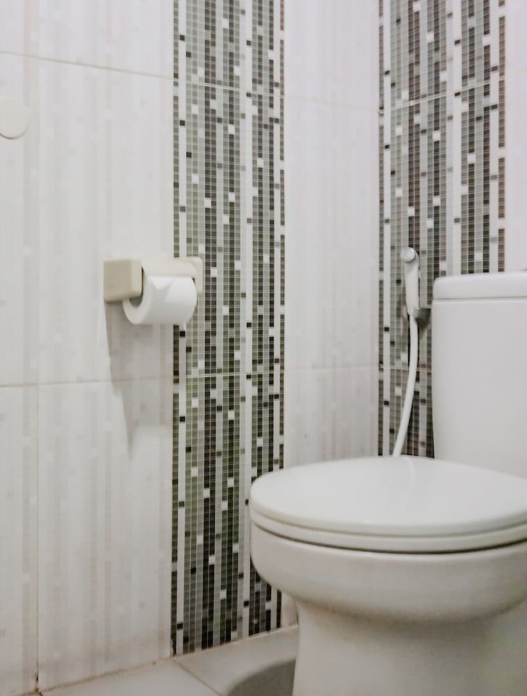 Collection O Hotel Antara Deluxe Twin Room 7