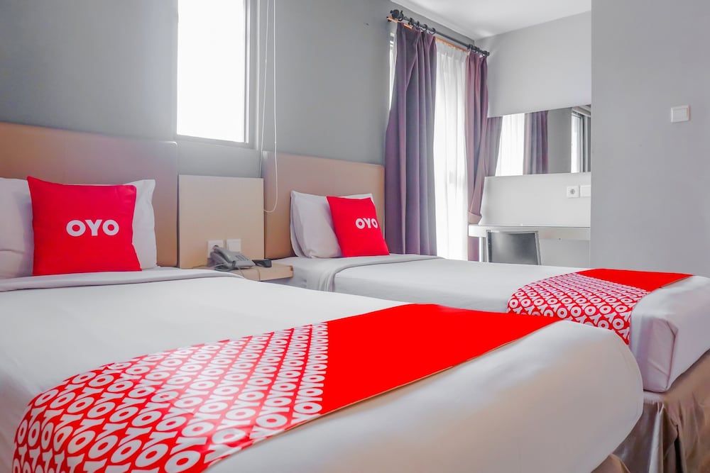 Collection O Hotel Antara Deluxe Twin Room 3