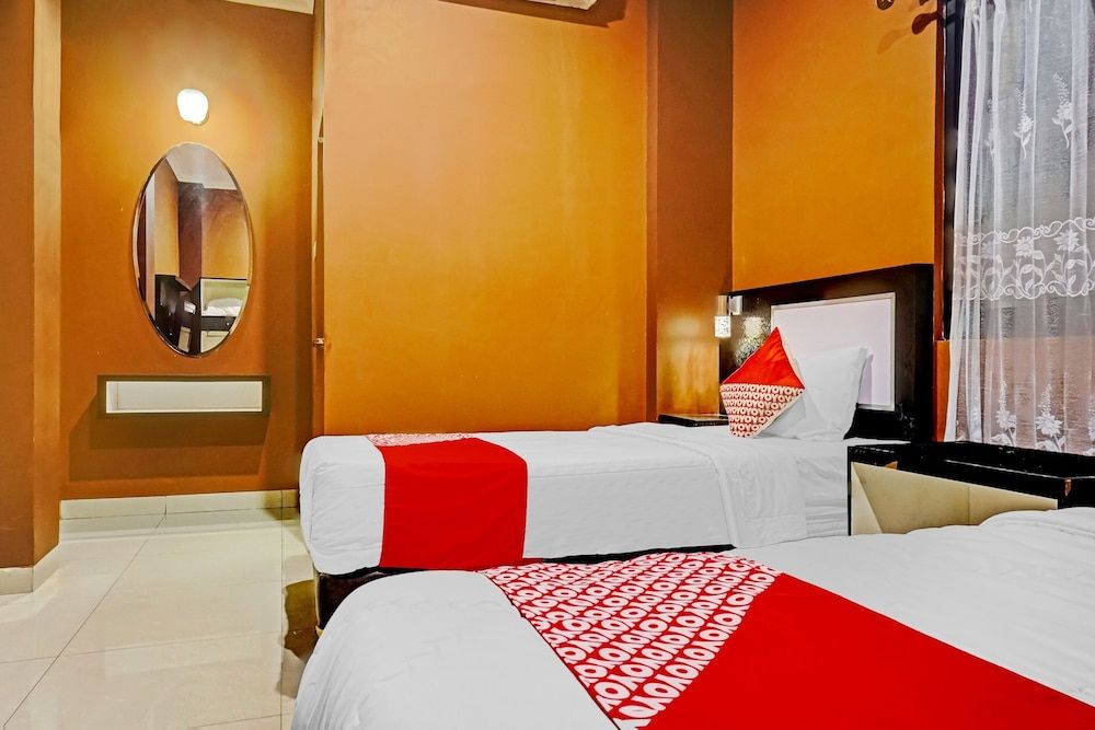 OYO 90660 Star Hotel Syariah Deluxe Twin Room 4