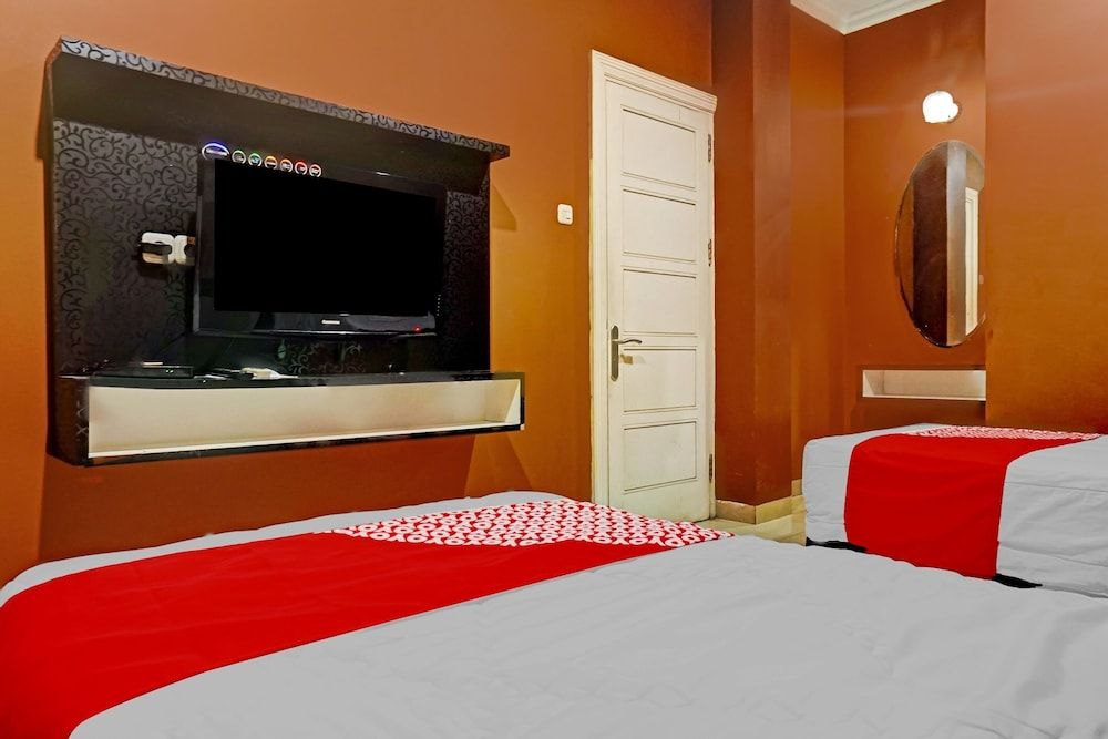 OYO 90660 Star Hotel Syariah Deluxe Double Room 11
