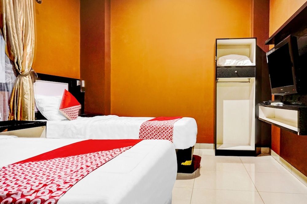 OYO 90660 Star Hotel Syariah Deluxe Twin Room 3
