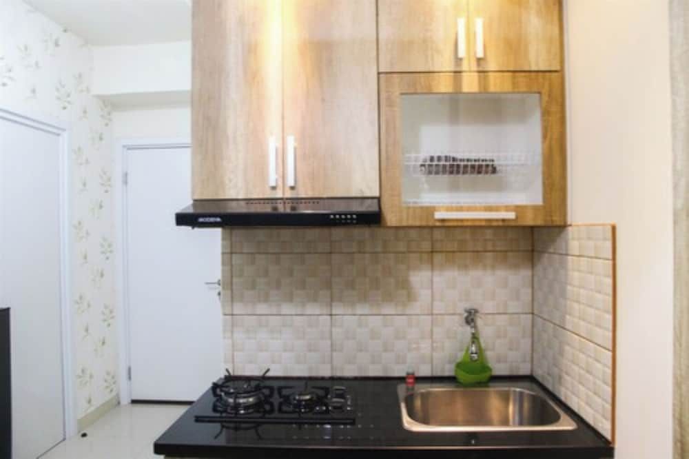 Well Designed 2BR Green Pramuka Apartment Room 10