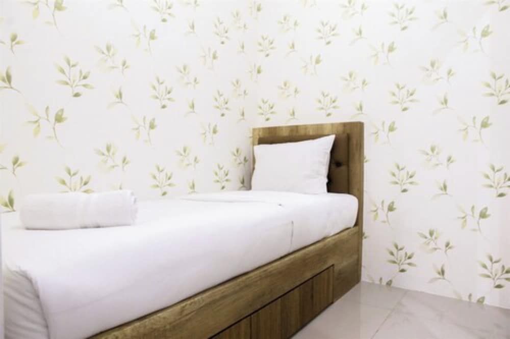 Well Designed 2BR Green Pramuka Apartment Room 9