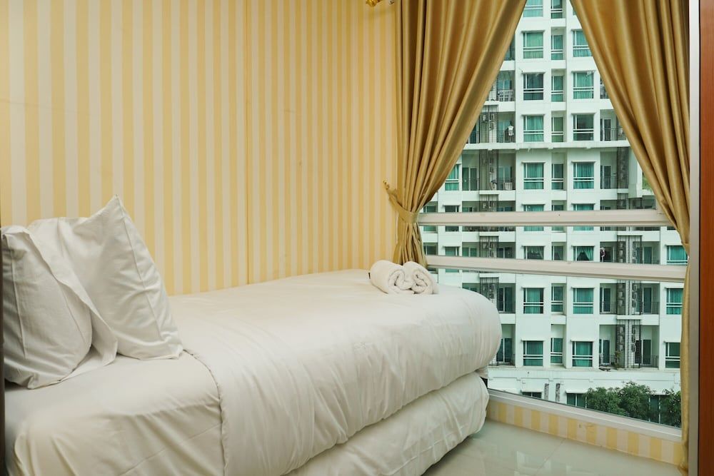 undefined 2BR Apartment with Sofa Bed at Woodland Park Residence 6