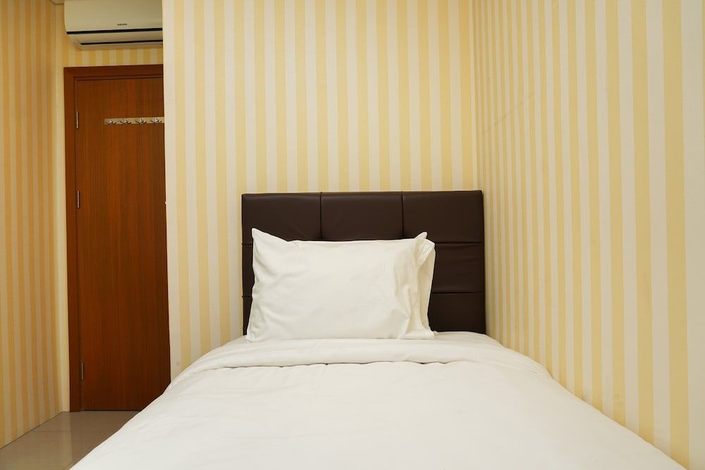 undefined 2BR Apartment with Sofa Bed at Woodland Park Residence 10