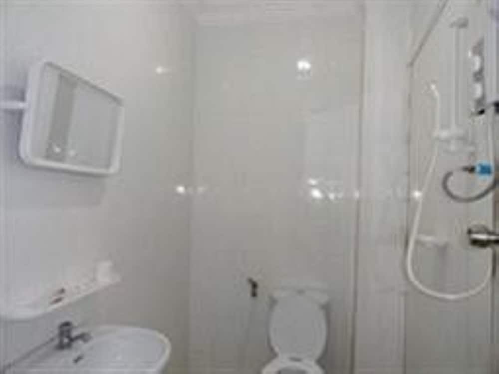 Sun Flower Mart Deluxe Triple Room 4