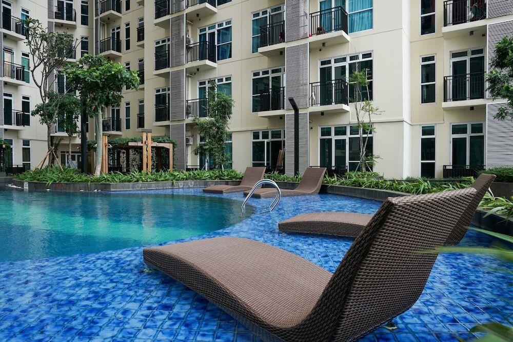 undefined Minimalist and Relaxing 1BR Apartment at Puri Orchard 4