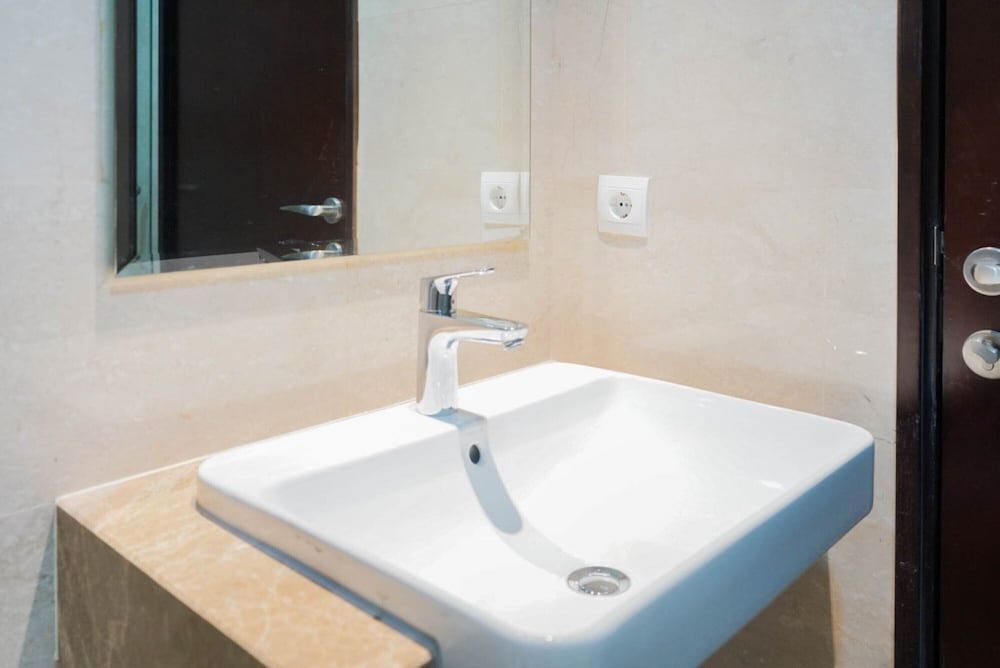 Minimalist and Homey Studio Menteng Park Apartment Room 10