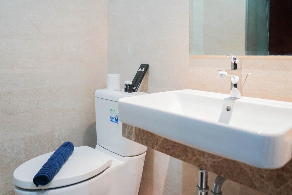 Minimalist and Homey Studio Menteng Park Apartment Room 9