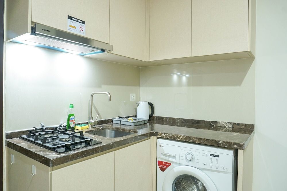 undefined Strategic Location 1BR Apartment @ Puri Mansion near Puri By Travelio 9