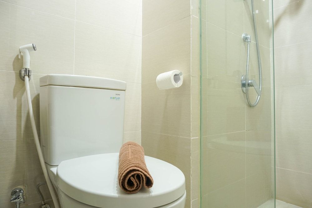 Strategic Location 1BR Apartment @ Puri Mansion near Puri By Travelio Room 13