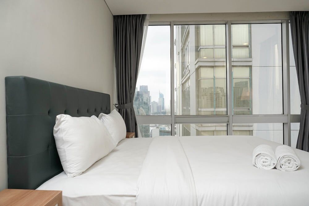 undefined Cozy 2BR at Empyreal Epicentrum Apartment By Travelio 4