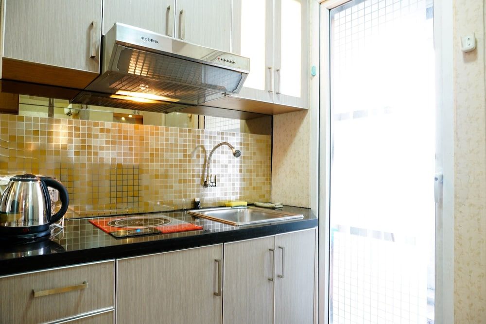 undefined Furnished Studio with Comfortable Design Green Pramuka Apartment 7