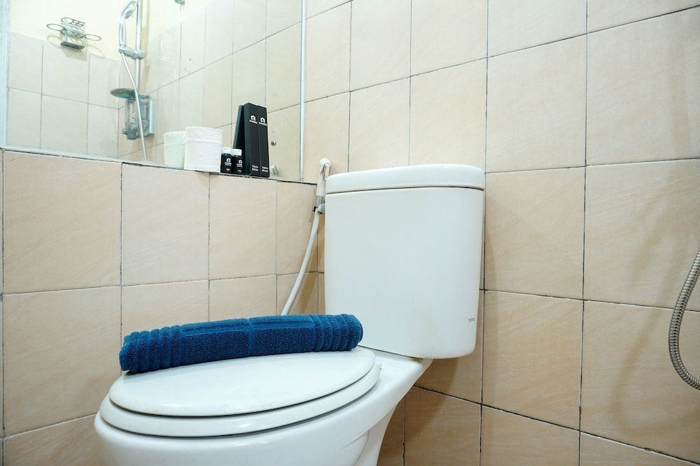 Furnished Studio with Comfortable Design Green Pramuka Apartment Room 6