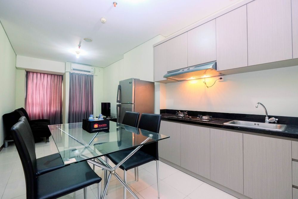 Elegant Nifarro Park 2BR Apartment with Best View Room 5