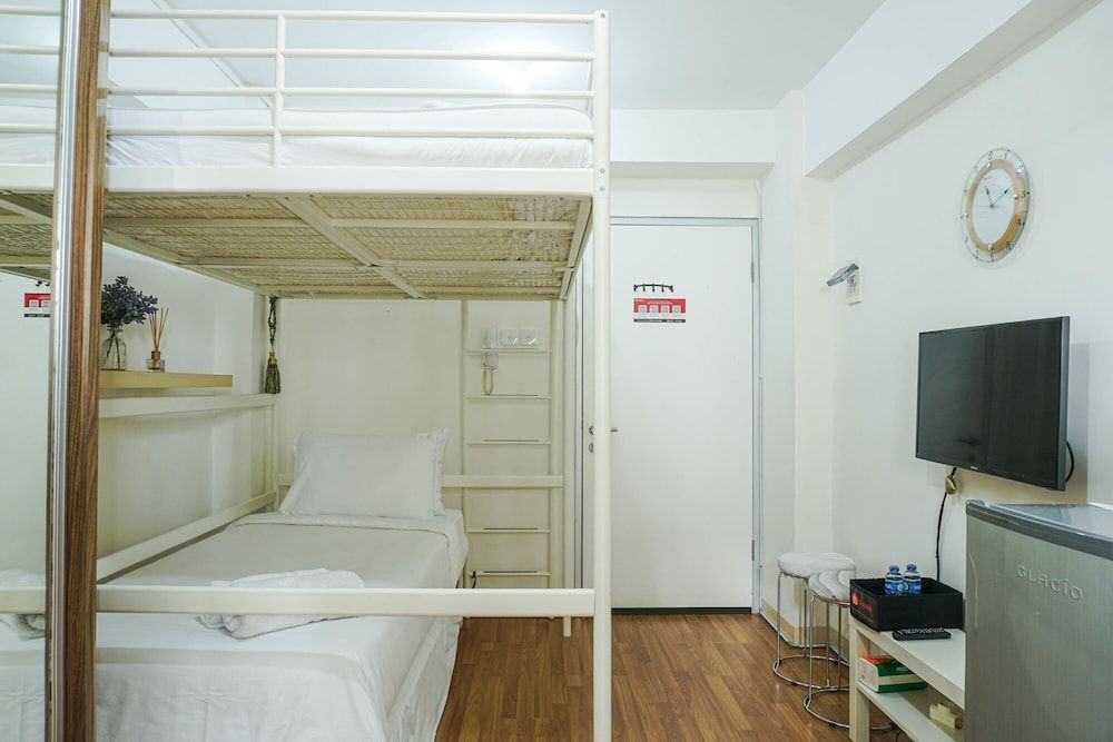 Compact and Scenic Studio Room Green Bay Pluit Apartment Room 12