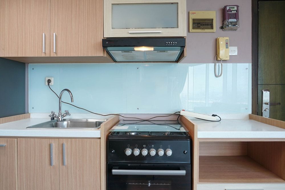 undefined Cozy Living 1BR Tamansari The Hive Apartment 10