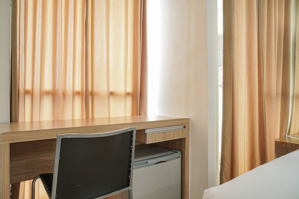 undefined Chic and Cozy Studio at Tifolia Apartment 9