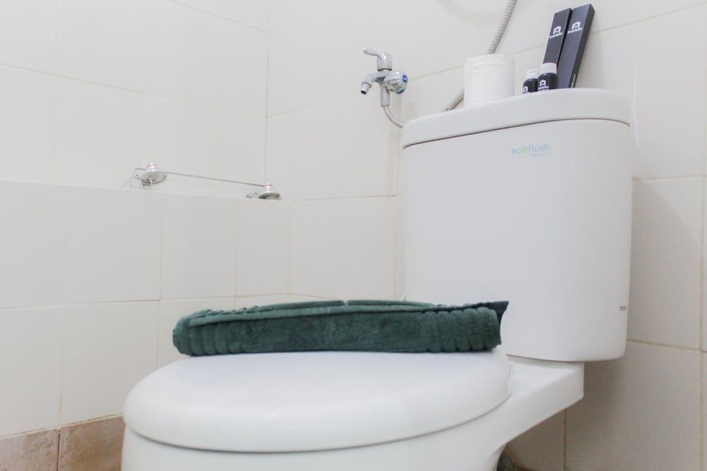 Homey and Cozy 2BR Bassura City Apartment near Mall Room 7