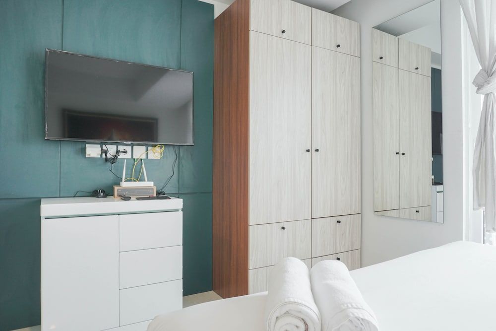 undefined Minimalist Studio Room With City View At West Vista Apartment 8