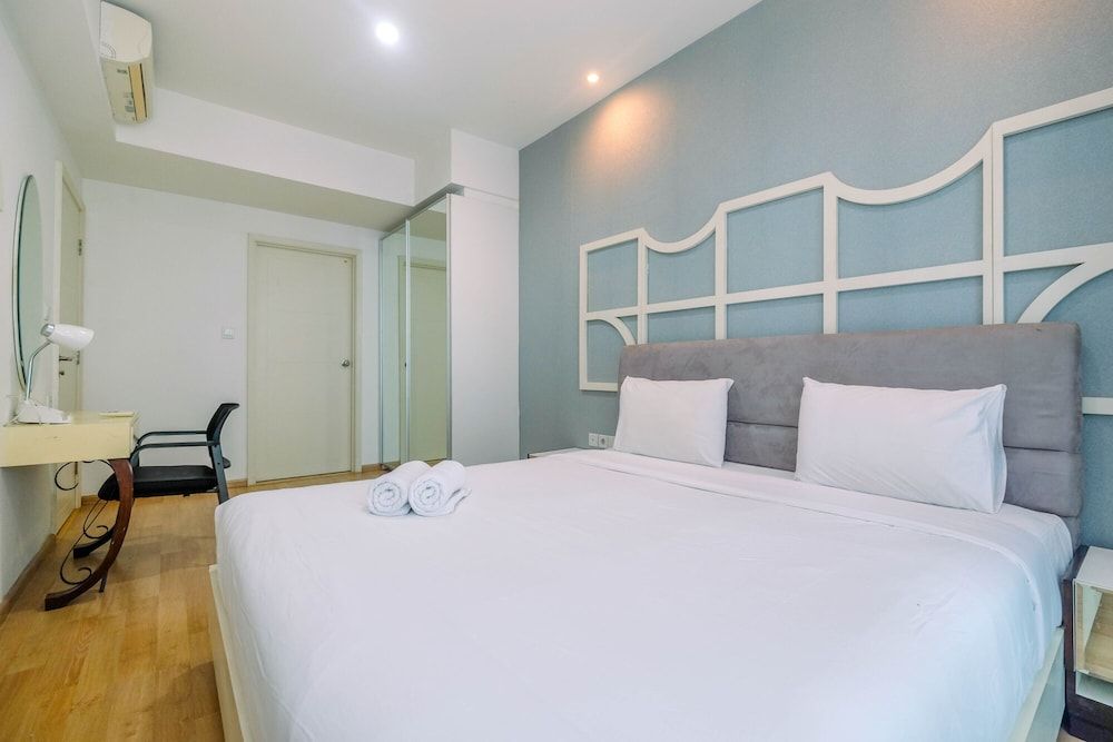 undefined Minimalist Furnished 1BR Apartment at Casa Grande Residence 9