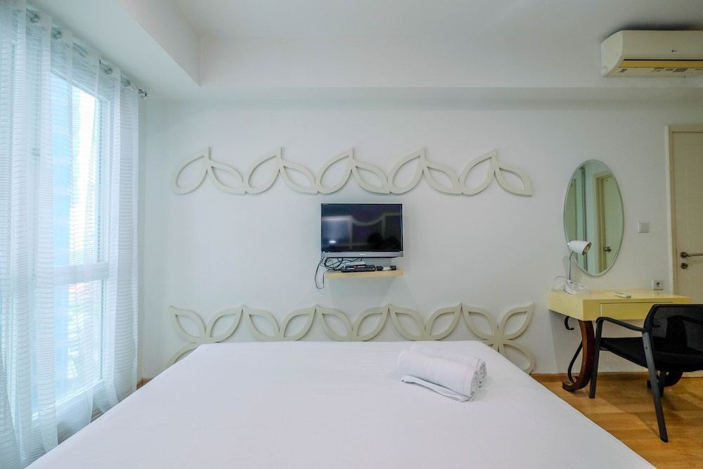 undefined Minimalist Furnished 1BR Apartment at Casa Grande Residence 8